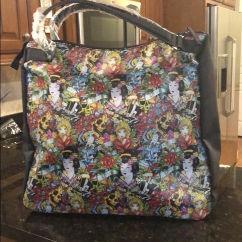Extra large Ed Hardy purse. Brand new never used.